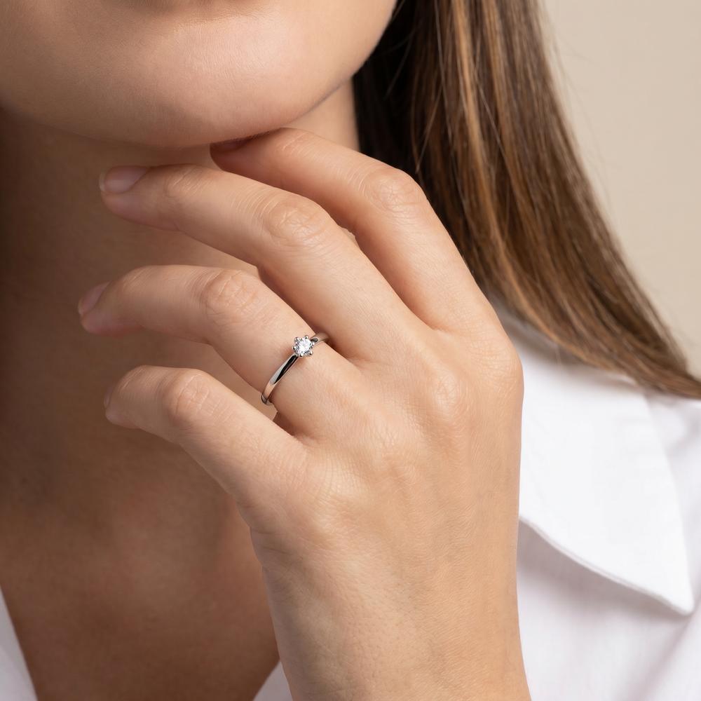 Solitär Ring 950 Platin Diamant weiss, 0.07 ct, Brillantschliff, w-si