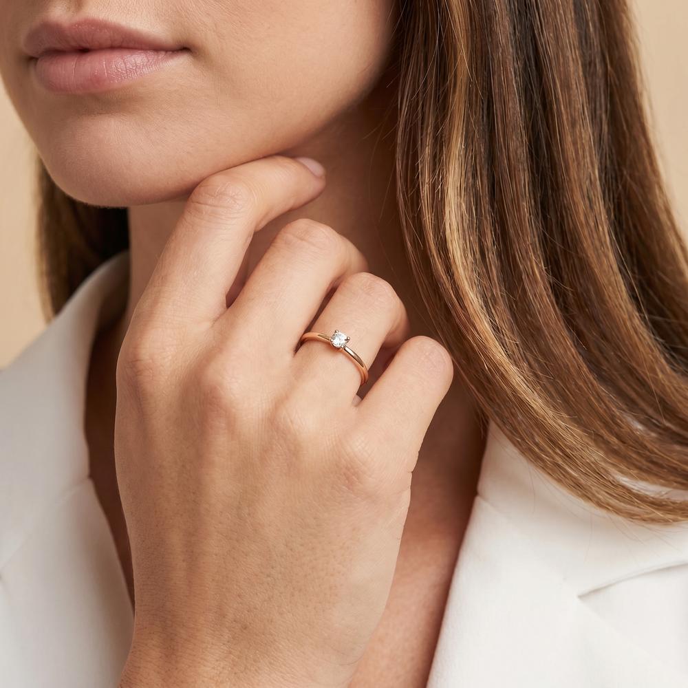 Solitär Ring 750/18 K Rotgold Diamant 0.15 ct, w-si