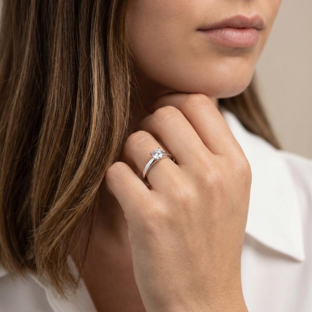 Solitär Ring 750/18 K Weissgold Diamant weiss, 1 ct, Brillantschliff, si, IGI Ø6 mm
